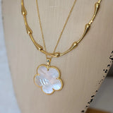 Victoria Necklace by Sahira Jewelry Design, gold-tone layered necklace with iridescent mother-of-pearl clover pendant