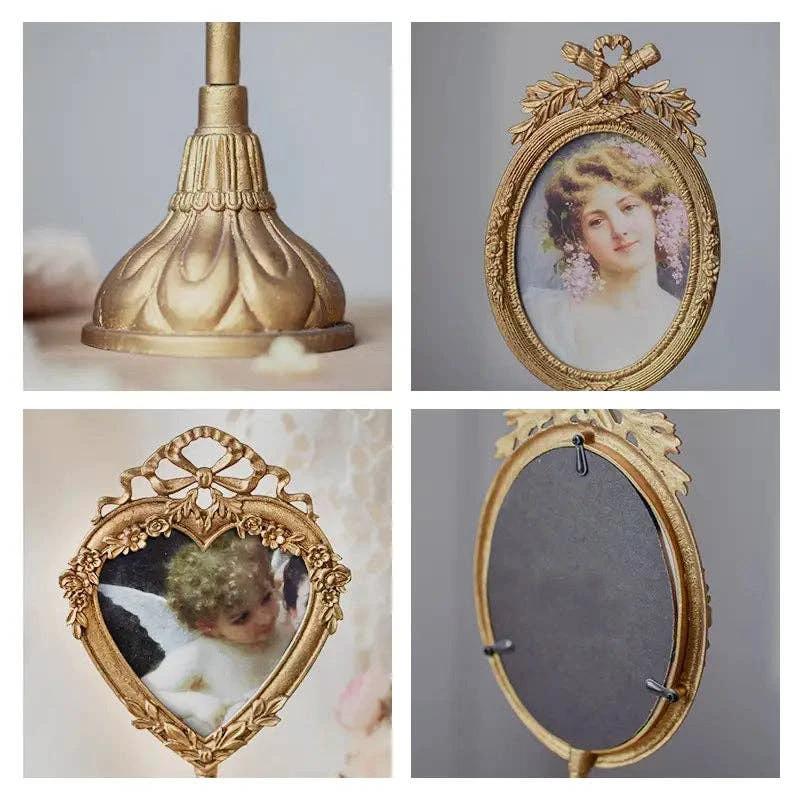 Gold vintage pedestal base with ribbed petal detailing.
Oval gold frame with floral border and bow top, holding a portrait.
Heart-shaped gold frame with floral border and ribbon crown, photo of a child.
Back view of oval gold frame with hanging hook and side clamps.